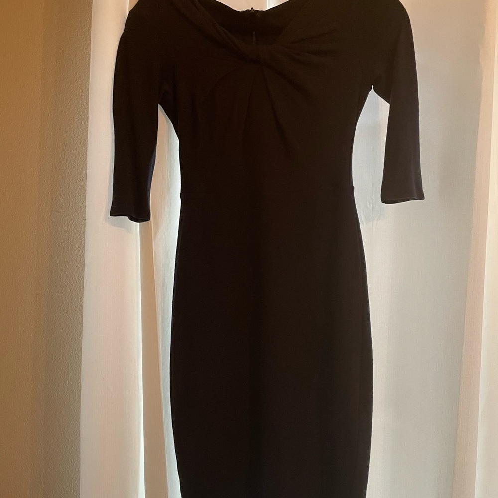 Figure-hugging subtly sexy dress with twist detail